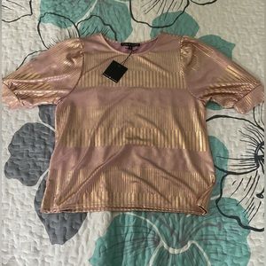 Selling a gorgeous top from Zoey and Leelo! It is gold and a pomegranate pink!